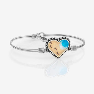 Blue spirited heart hot sale chain ring